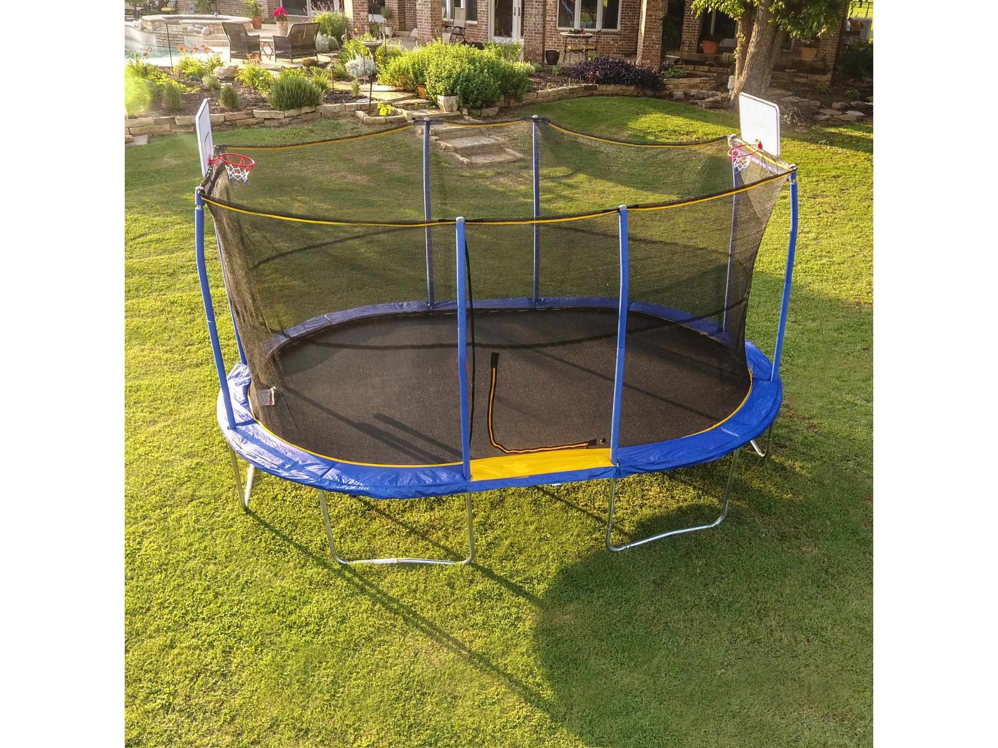 JumpKing 10' x 15' Oval Trampoline with Basketball Hoop JK1015OVWBH-DAL